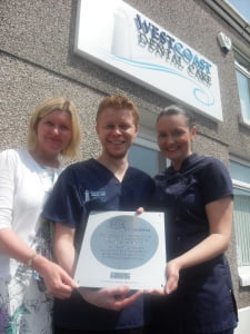 GPS team and plaque
